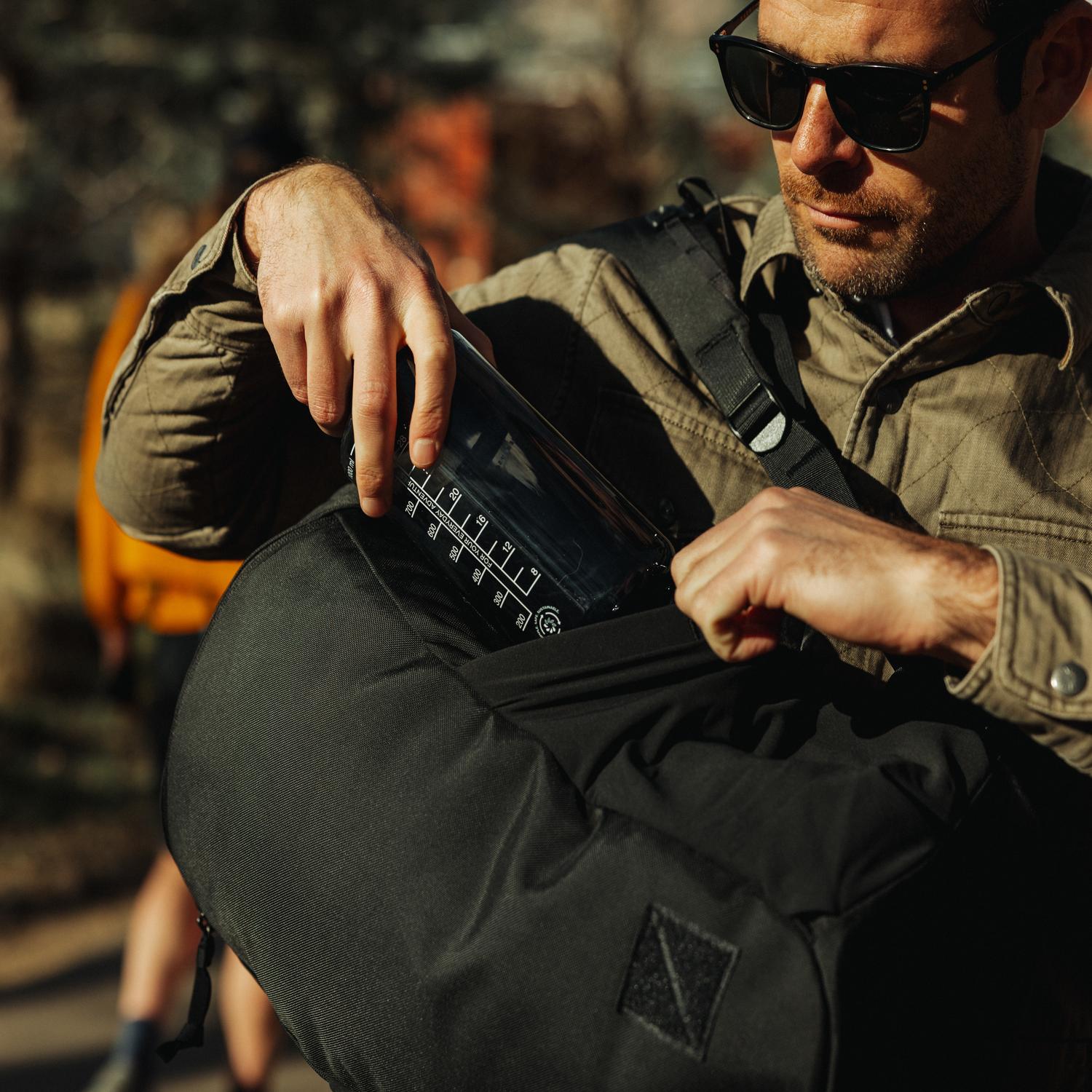 Evergoods Civic Half Zip 26L - Solution Dyed Black - Lifestyle Image