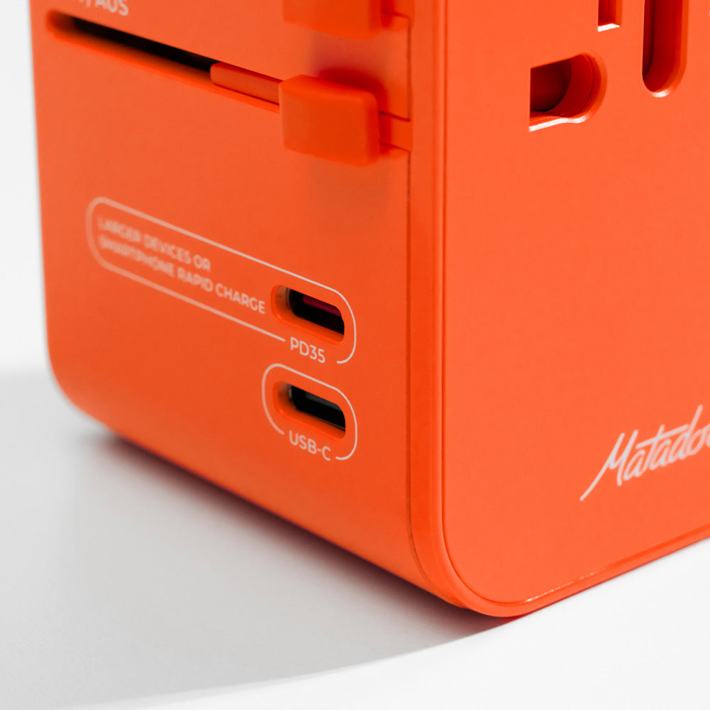 Matador Global Travel Adapter - Forget-Me-Not Orange