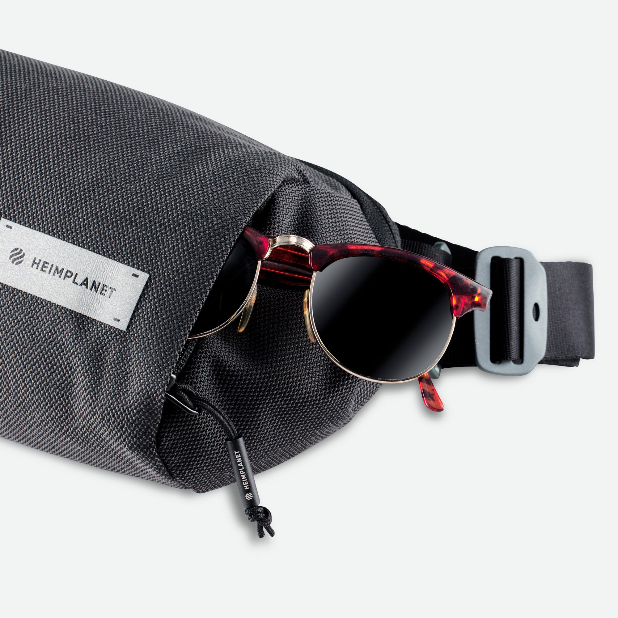 Heimplanet Transit Sling Pocket lomme til solbriller
