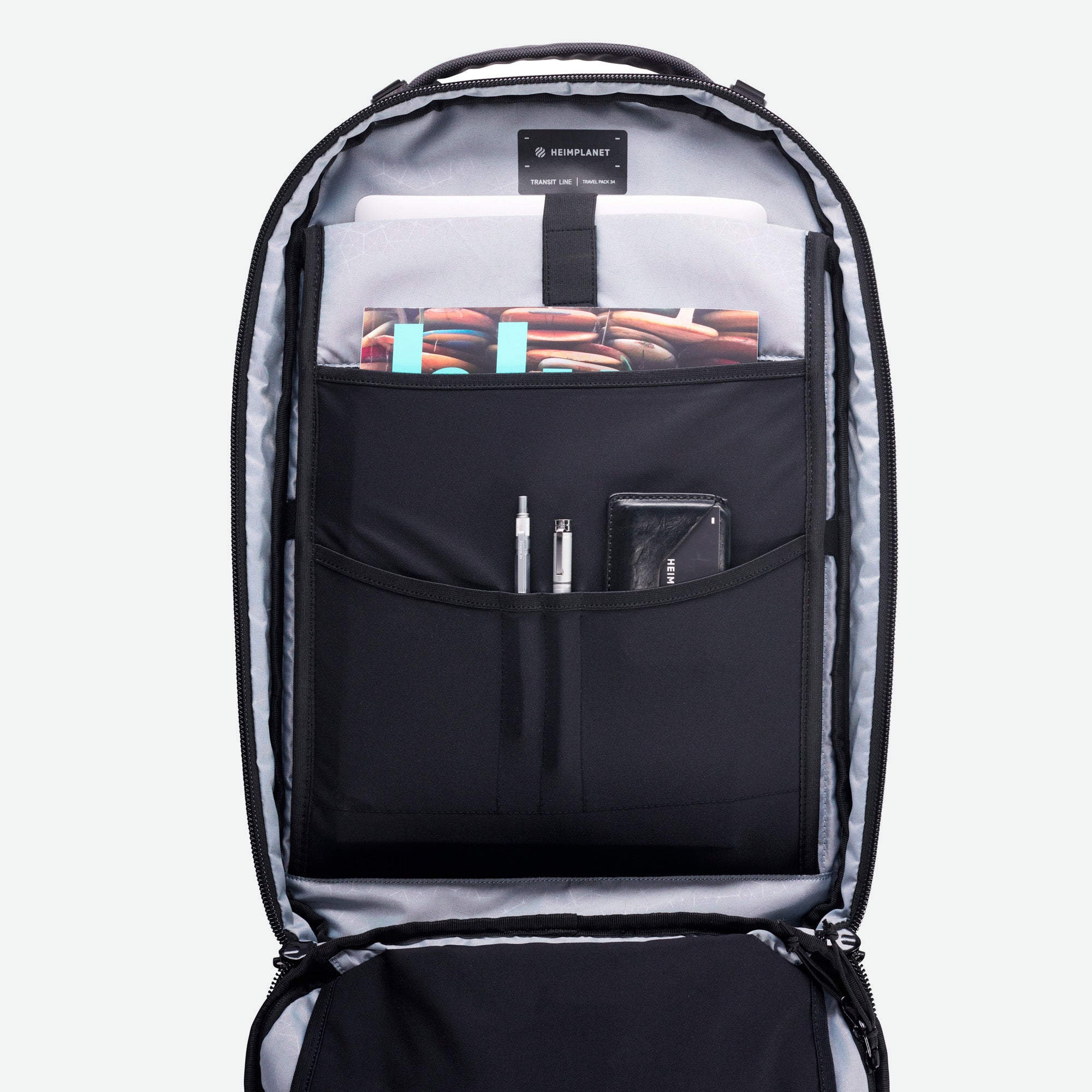 Heimplanet rejsetaske 34 L sort indvendigt design